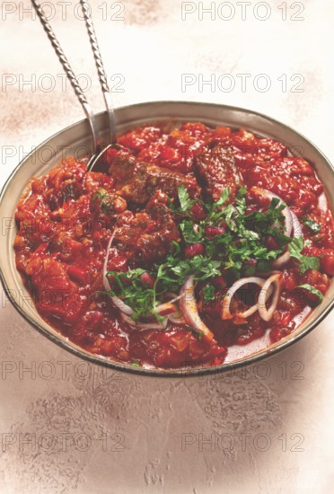 Chashushuli, a traditional Georgian dish, spicy, stewed meat with tomatoes and spices, homemade, no