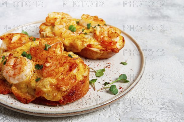 Sandwiches with shrimp and cheese, baked in the oven, with microgreens, breakfast, homemade, no