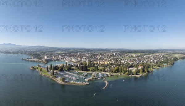 Harbour area, ferry port, yacht harbour, marina of the town of Romanshorn with Seepark, far left