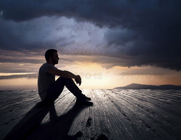 Silhouette of a person sitting alone within a brick archway, observing a peaceful and scenic cloudy