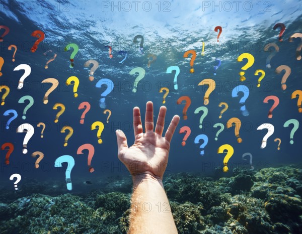 An extended hand emerges from water surrounded by floating question marks, artistically