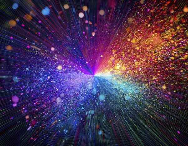 Vibrant and energetic multicolored powder explosion captured against a dark background. Evoking