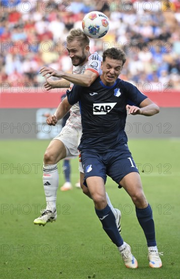 Header duel duel action Fisnik Asllani TSG 1899 Hoffenheim (11) against Konrad Laimer FC Bayern