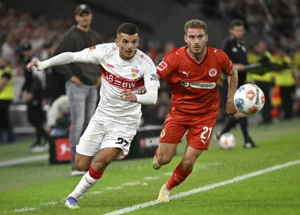 One-on-one, action Badredine Bouanani VfB Stuttgart (27) against Lars Ritzka FC St. Pauli (21)