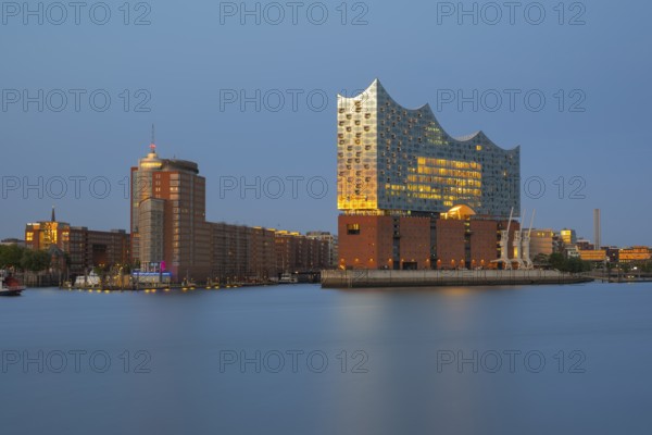 View over the Norderelbe to the Elbphilharmonie in the evening light, long exposure, Hamburg,