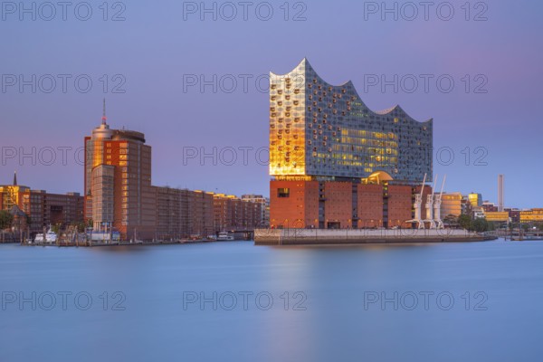 View over the Norderelbe to the Elbphilharmonie in the evening light, long exposure, Hamburg,