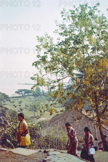 View over Coronation Park to coastline prior to land reclamation, Malacca or Melaka, Malaya,