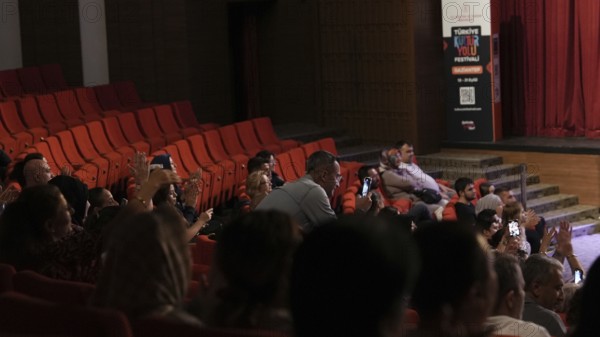 Turkish singer Coskun Sabah performs on stage at Gaziantep University as part of the Türkiye Kültür