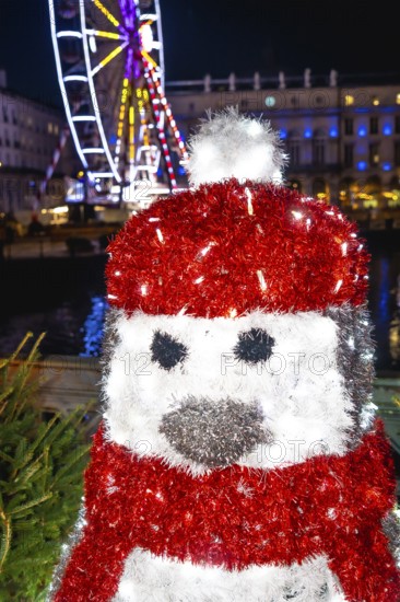 Festive penguin decoration adds a touch of magic to the christmas market in bayonne, france, with a