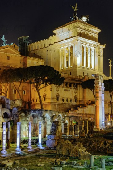 View at night over the Caesar Forum of Julius Caesar, illuminated in colour from the front, with