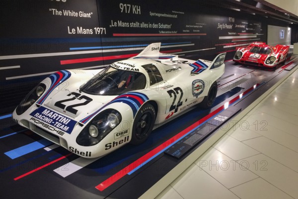 In the front, historic Porsche 917 No. 22 racing car with magnesium cage by racing driver Dr Helmut