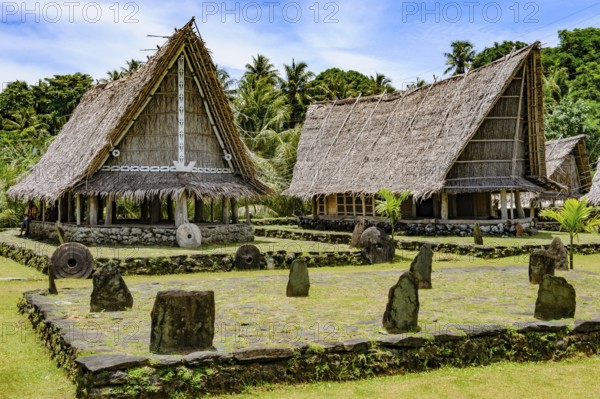 Left traditional community house right Faluw men's house Men's House meeting houses in museum