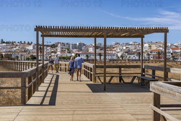 The skyline of the historic centre of Lagos, on the river Bensafrim, view from the boardwalk on the