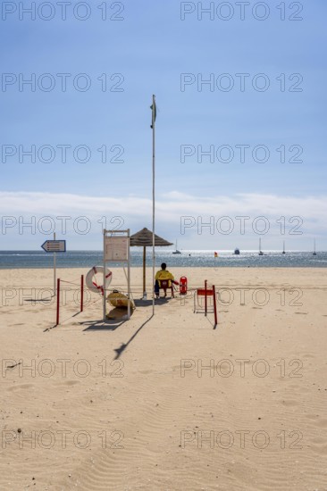 The Praia de São Roque beach, east of Lagos town centre, quite empty, lifeguards on duty,