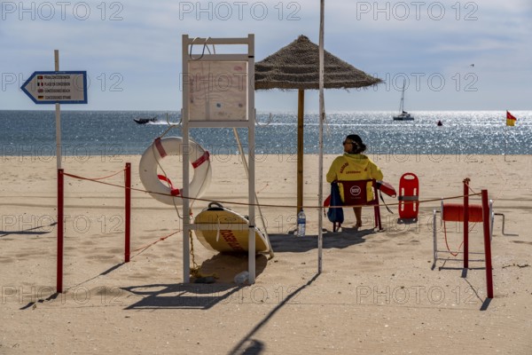 The Praia de São Roque beach, east of Lagos town centre, quite empty, lifeguards on duty,