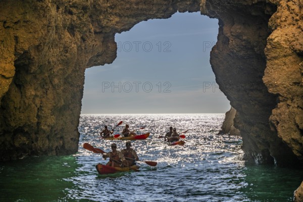 Tour with sea kayaks to the Ponta da Piedade rocky coast, rugged coastal landscape, right next to