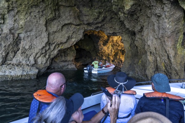 Tour with a small motorboat to the Ponta da Piedade rocky coast, rugged coastal landscape, right