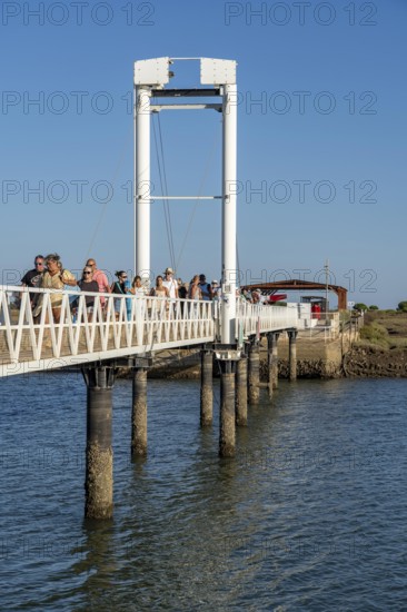 Bridge over the lagoon to the kilometre-long sandy beach Praia do Barril, on the island off Santa