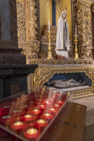 Faro, Faro Cathedral, nave, interior, altar of the Virgin Mary, digital, LED candles for donations,