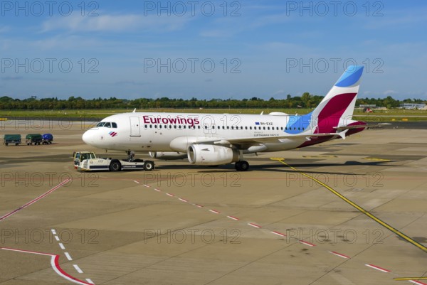 Düsseldorf, North Rhine-Westphalia, Germany - Düsseldorf Airport, Eurowings aircraft being towed by
