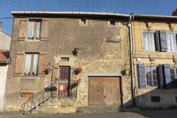 Historic house façade, yellow sandstone, Marville, Renaissance village, Département Meuse, Grand