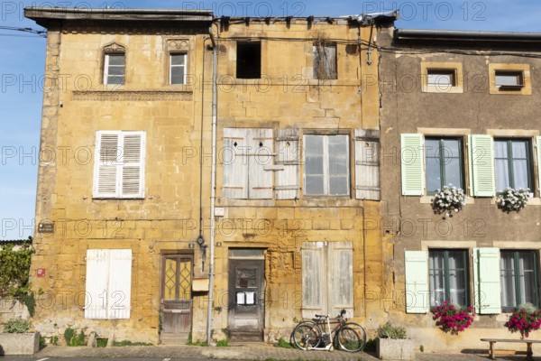Historic house façade, yellow sandstone, Marville, Renaissance village, Département Meuse, Grand