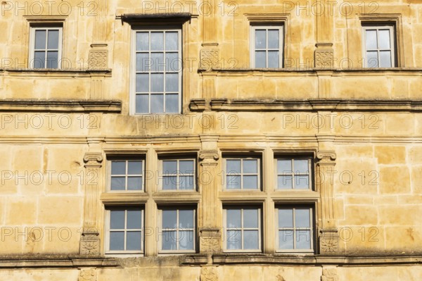 Window, historic house facade, yellow sandstone, Marville, Renaissance village, Département Meuse,