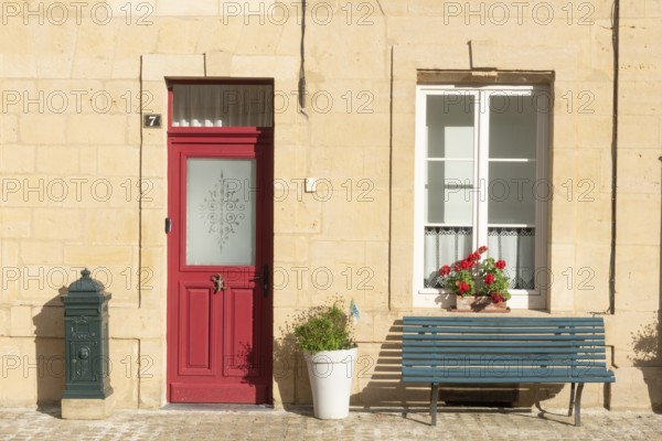 Entrance decorated with flowers, bench, Marville, Renaissance village, Département Meuse, Grand