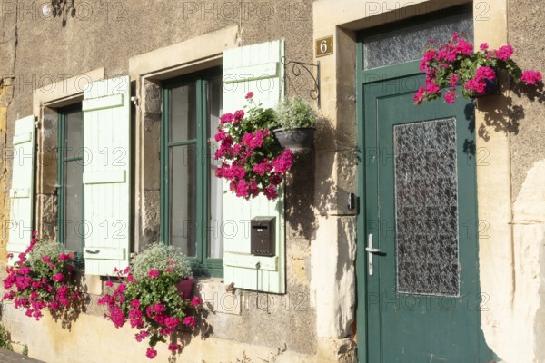 Entrance decorated with flowers, Marville, Renaissance village, Département Meuse, Grand Est,