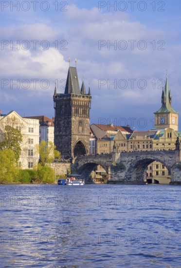Charles Bridge (Karluv Most) on Vltava river and Old Town Bridge Tower, famous tourist destination