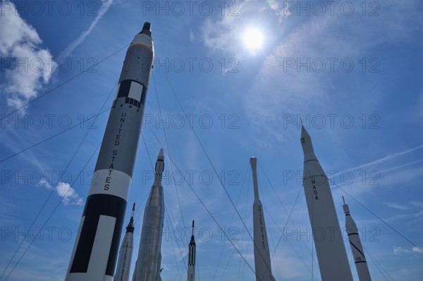Rockets in a formation under bright sunshine and blue sky, Kennedy Space Centre Visitor Complex,