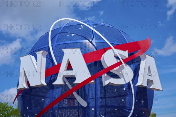 NASA logo in front of a blue, cloudy sky, Kennedy Space Centre Visitor Complex, Merritt Island,
