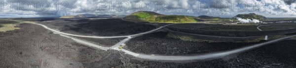 Lava, lava field, road, destroyed, summer, cloudy, sunny, panorama, aerial view Blue Lagoon,
