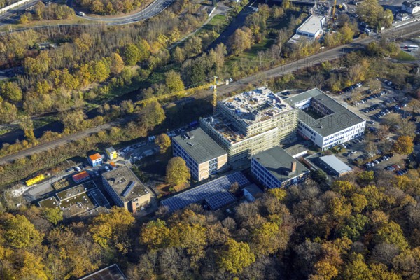 Aerial view, construction site and new building at the Berufskolleg Berliner Platz in the district