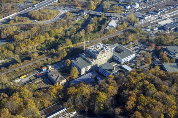 Aerial view, construction site and new building at the Berufskolleg Berliner Platz in the district