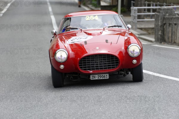 No. 254, Ferrari 250 MM berinetta Pinin Farina, built in 1953, red retro car drives head-on on an
