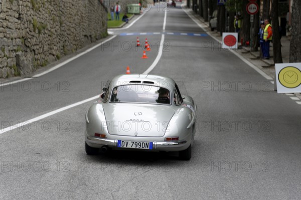 No. 279, Mercedes-Benz 300 SL W 198, model year 1954, silver classic car on a road with cones in a