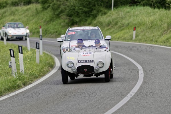White classic car on rural road in green surroundings, classic car, car race, Mille Miglia, 1000