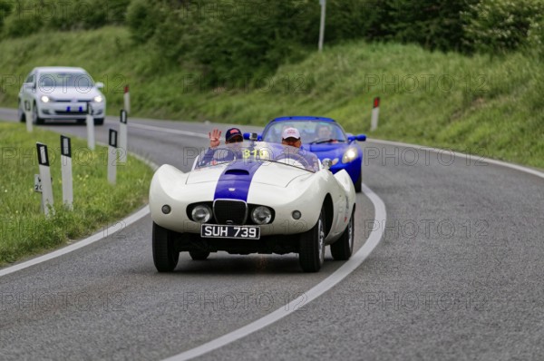 White classic car accompanied by a blue vehicle on a country road, classic car, car race, Mille