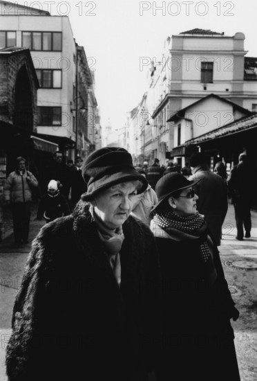 BIH, Bosnia, Sarajevo, 12.01.2006, Women wearing fur walk through the old town