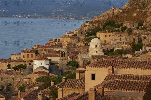 Soft morning light, Holy Church of the Virgin Mary Myrtidiotissa (or Critikias), hillside urban