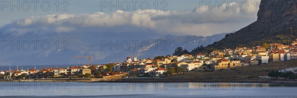 Coastal town at dusk with mountains and cloudy sky, Monemvasia, Monemvassia, Malvasy, Byzantine