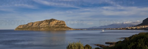 View of a large island in the sea under a clear blue sky, Monemvasia, Monemvassia, Malvasy,