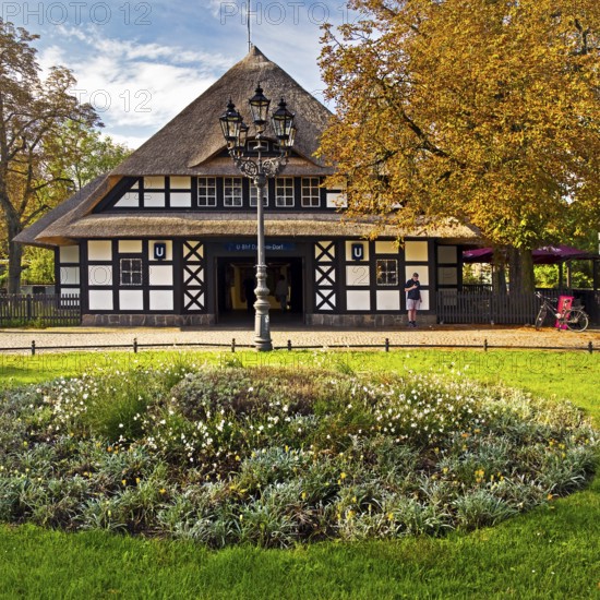 Entrance to Dahlem-Dorf subway station, thatched half-timbered house in the style of a North German