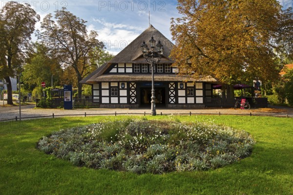 Entrance to Dahlem-Dorf subway station, thatched half-timbered house in the style of a North German