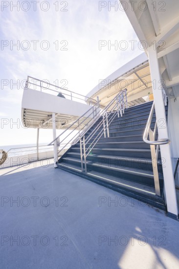 A steep staircase leads up to a deck, with a wide view of the sea, Schifffahrt, Lake Constance,