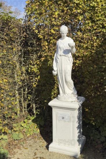 Statue of in Greek mythology goddess of youth Hebe Roman goddess Iuventas of male youth holding a