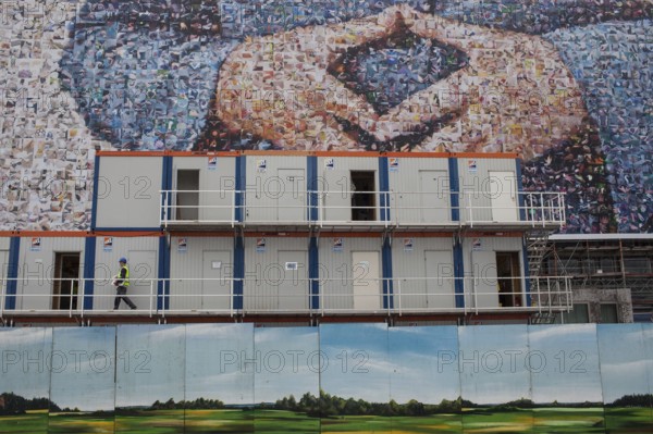 DEU Germany Germany Berlin large poster with Angela Merkel's hands, Merkel diamond, on a building