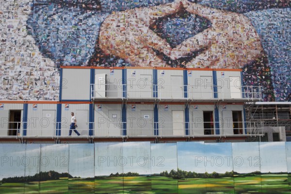 DEU Germany Germany Berlin large poster with Angela Merkel's hands, Merkel diamond, on a building