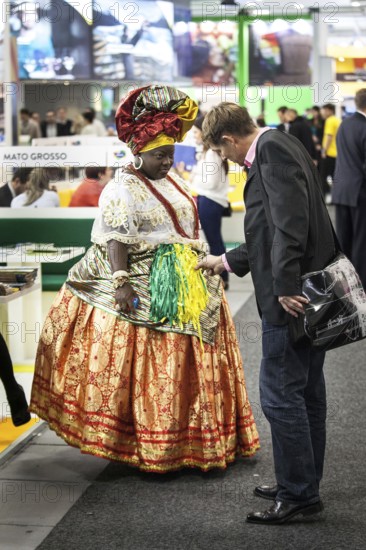 DEU Germany Germany Berlin International Tourism Exchange ITB. A visitor looks at the traditional